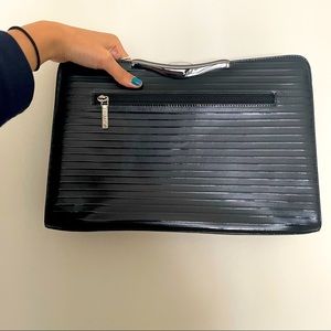 Chic unworn black leather clutch